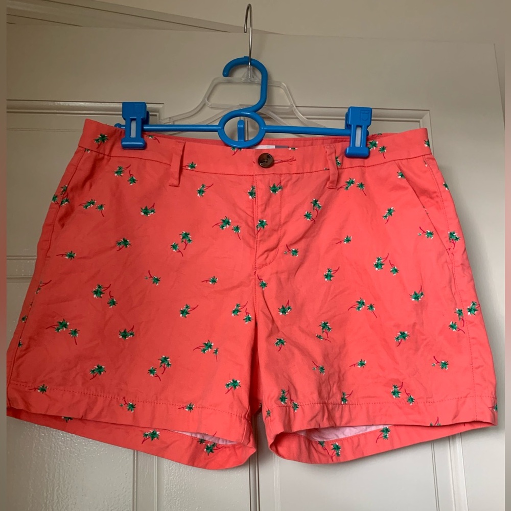 Old Navy shorts with palm tree print.